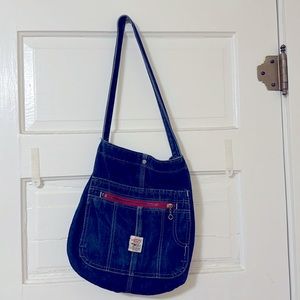Vintage, denim pointer shoulder bag with snap closure